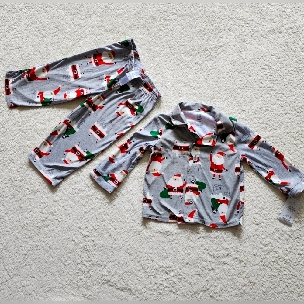 NEW boy's Christmas 2 piece pajama set with all over Santa Claus print